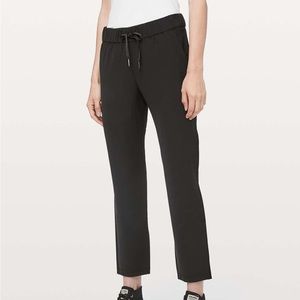 Lululemon black on the fly woven pants 27”